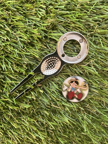 PINOCCHIO GOLF BALL MARKER AND PITCH REPAIR TOOL