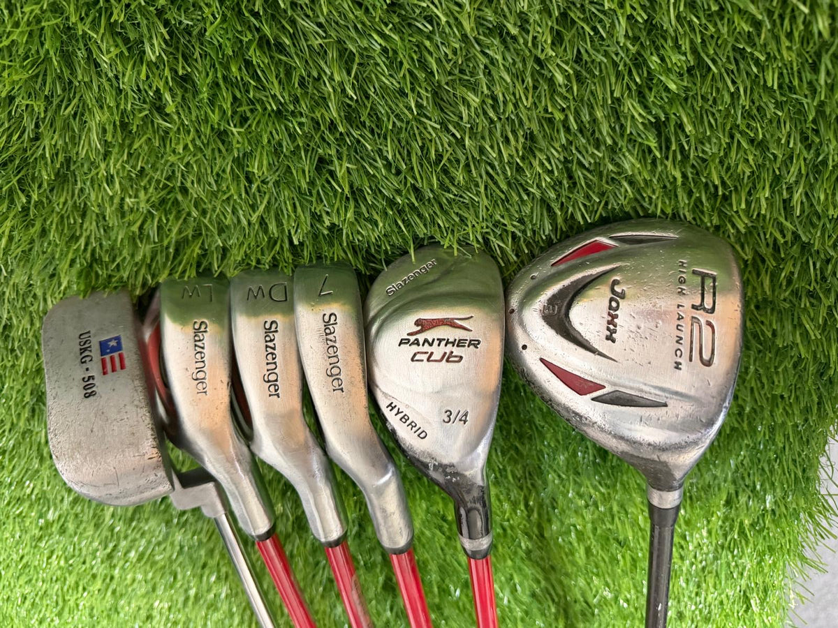Junior Right Handed Golf Clubs and Bag Set. All in good used condition, 7 iron measures 27 inches so suitable for 5-7 year olds.