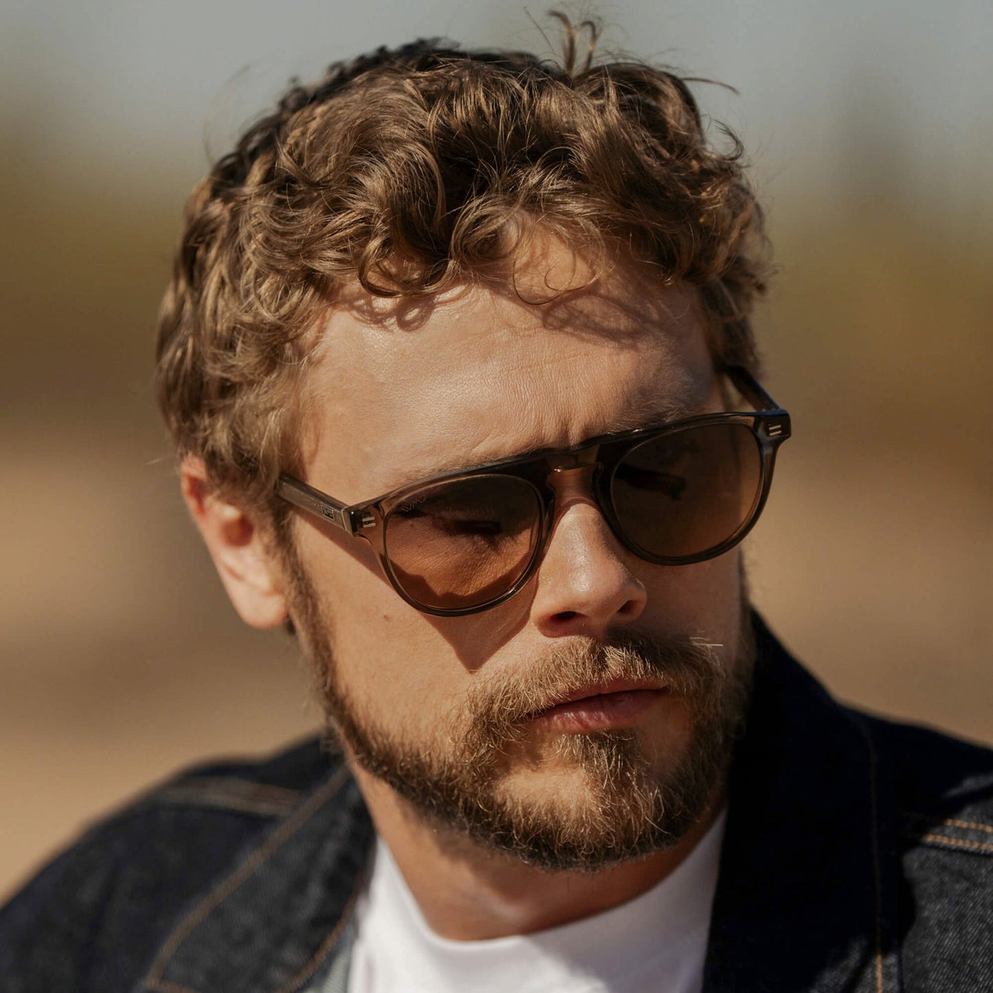 Lunettes de soleil aviateur rondes AXEL pour homme, couleur bronze cristal, par WMP Eyewear UK