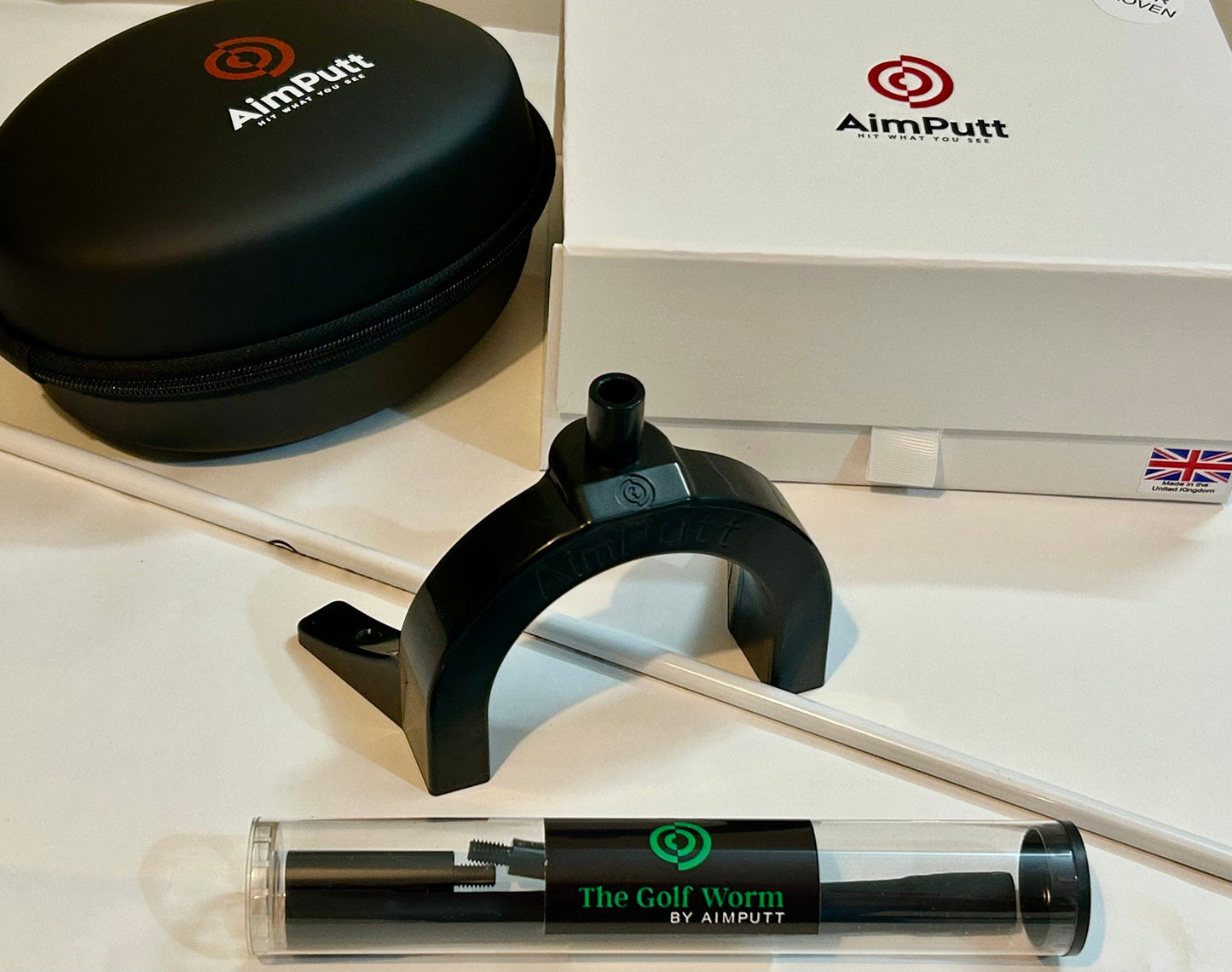 The Aimputt Trainer and The Golf Worm package.