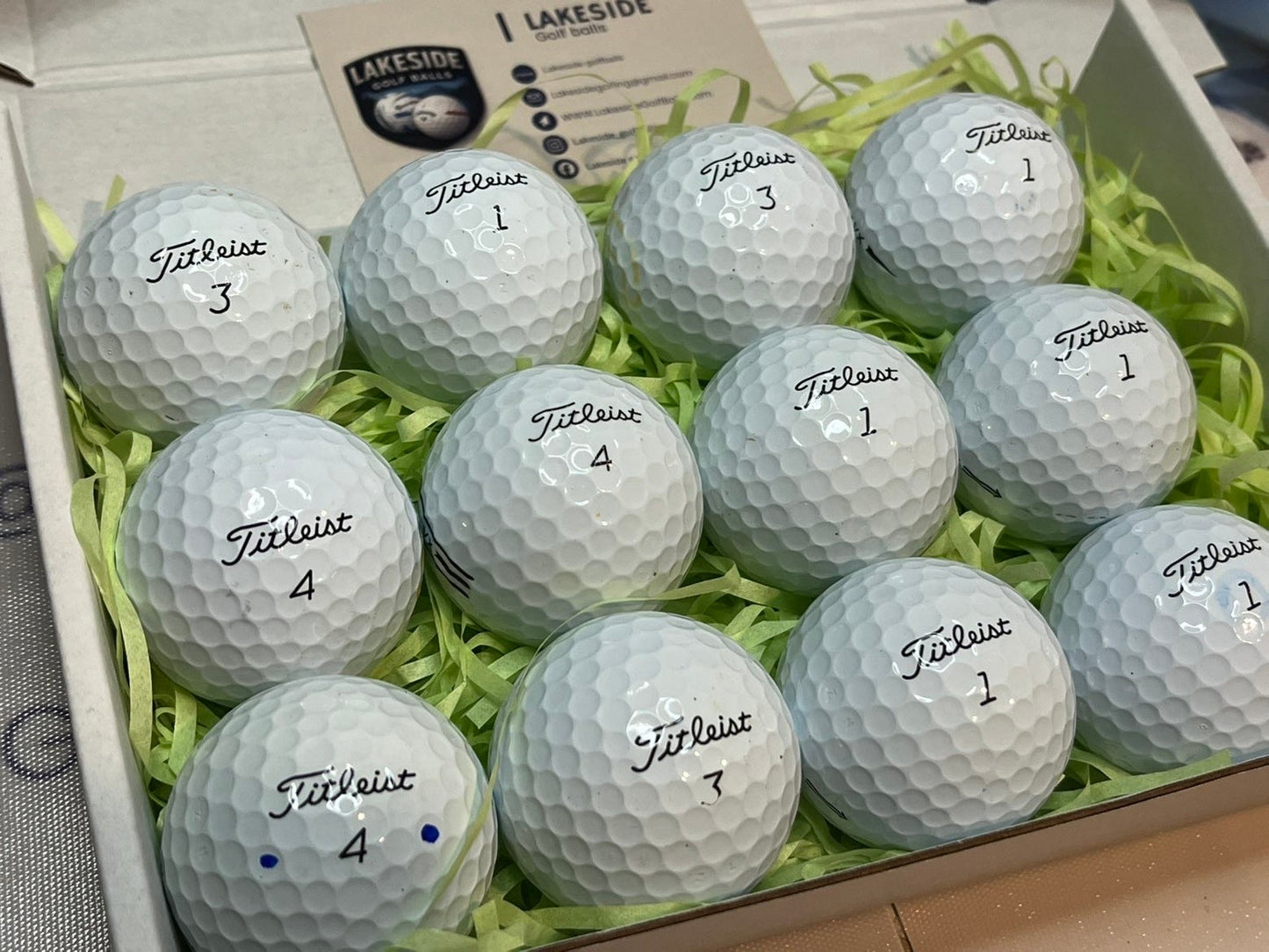 12 Titleist AVX White Golf balls
