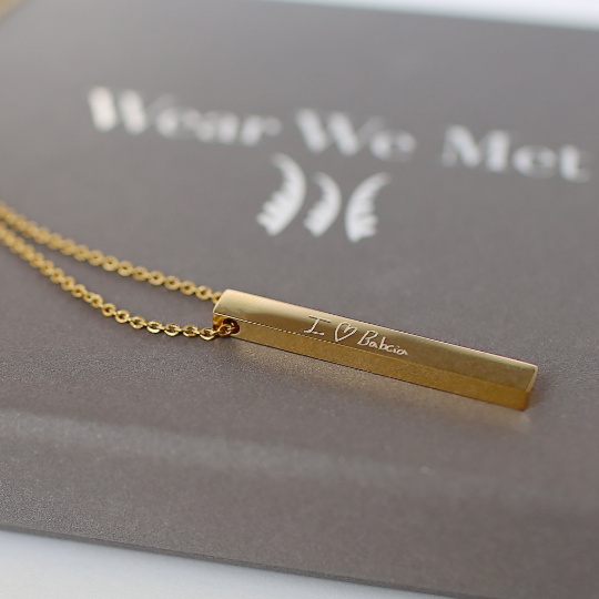 Collier avec barre d'écriture manuscrite