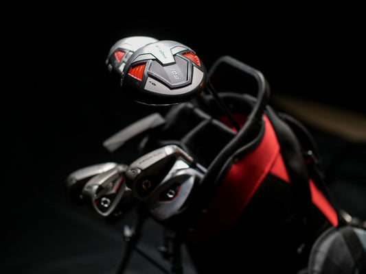 High-quality close-up of modern golf clubs in a stylish bag, perfect for golf enthusiasts.