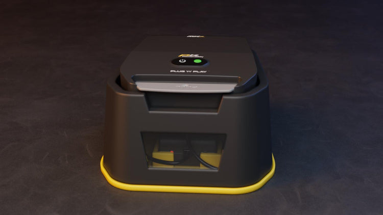 Official PowaKaddy golf trolley battery and charging accessories displayed together on a golf course setting