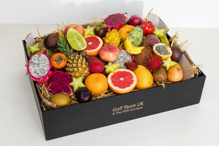 Exotic fruit-themed golf accessory gift box for UK golfers by The Fifth Orchard