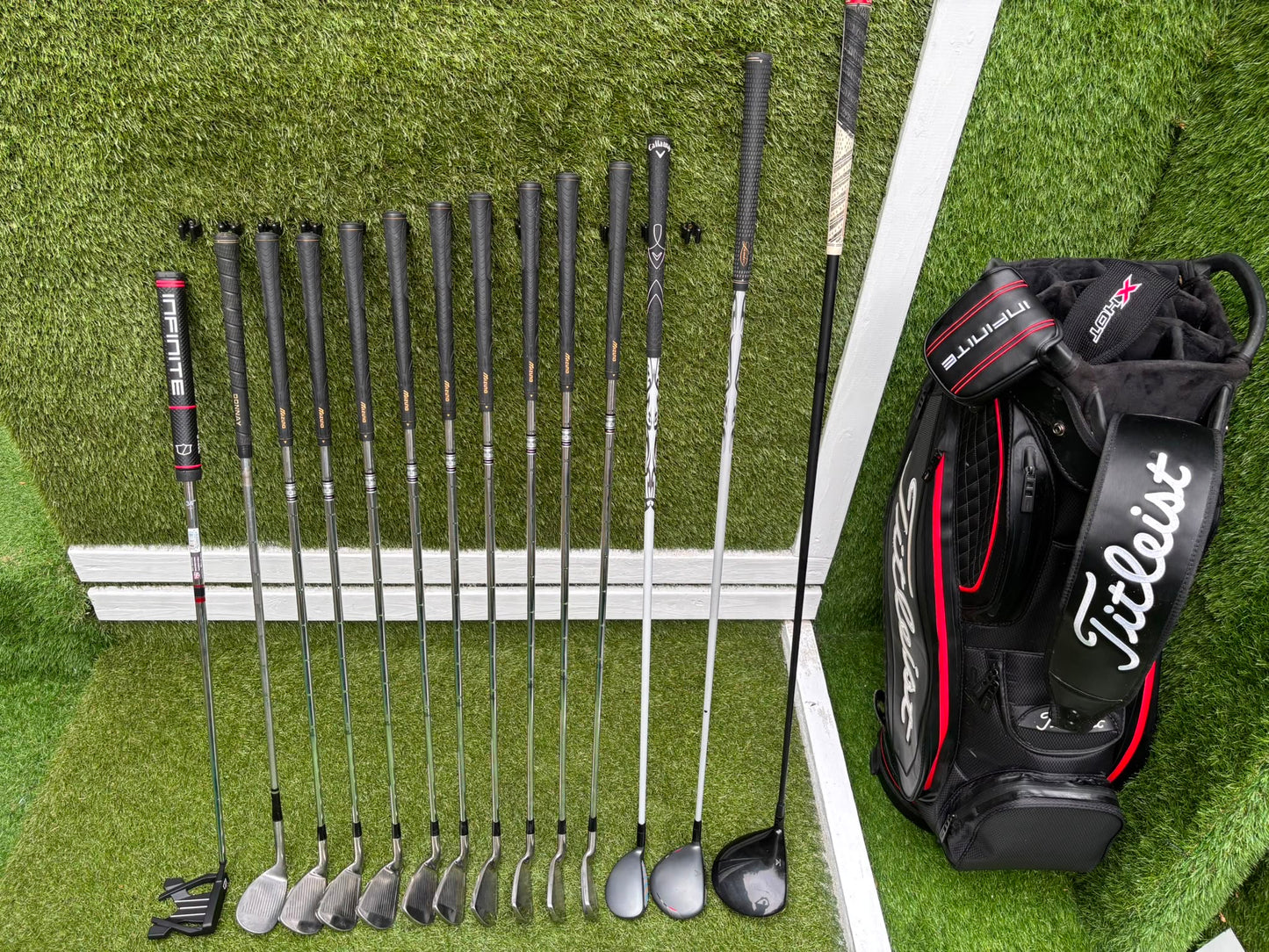 Mizuno Widec II Irons, Titleist 913 Driver, Callaway X Hot Woods, Wilson Infinite Putter & Titleist StaDry Cart Bag