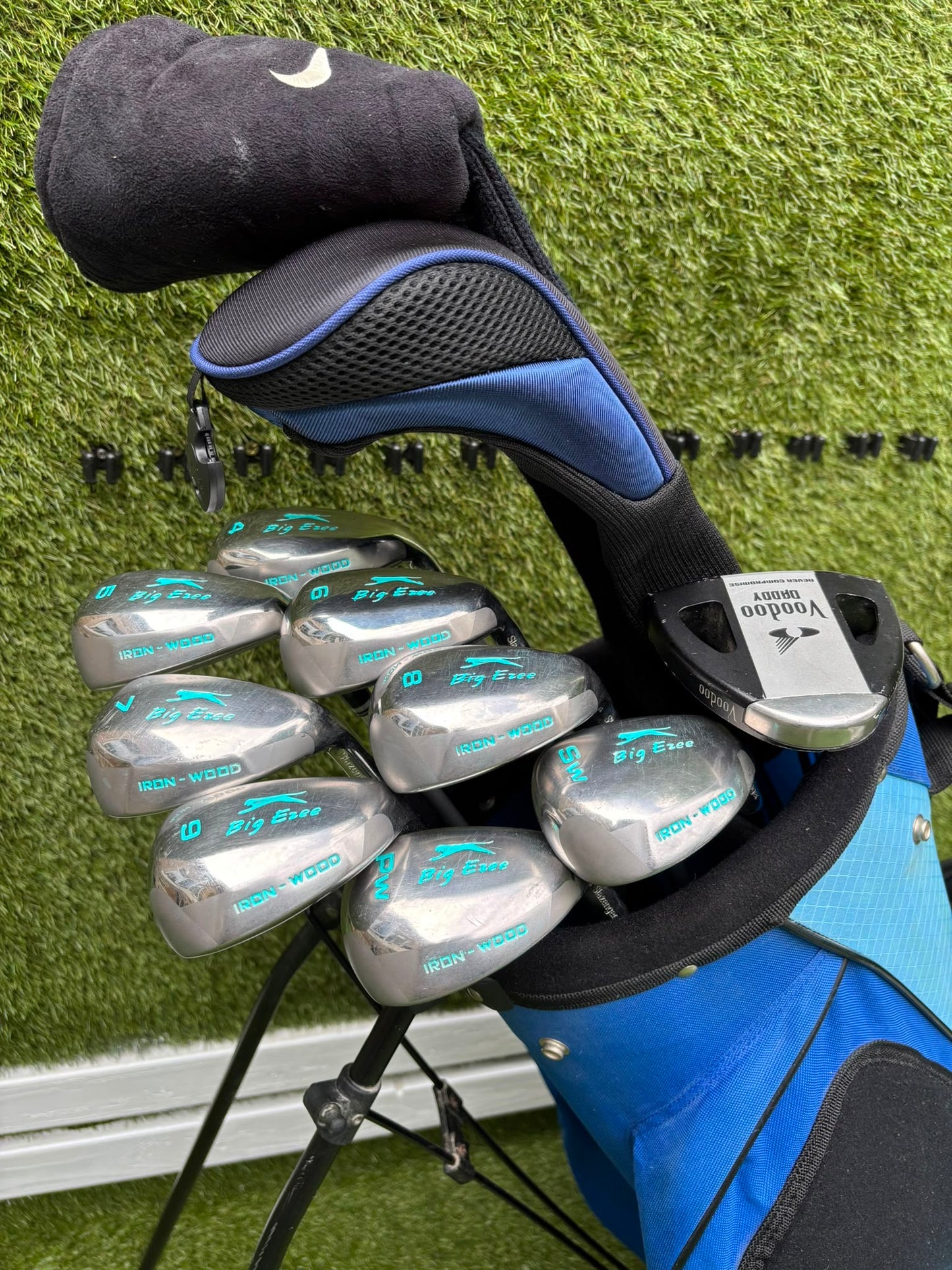 Slazenger Iron-Woods, Nike Driver, Wilson Fairway Wood, Voodoo Daddy Putter & Stand Bag