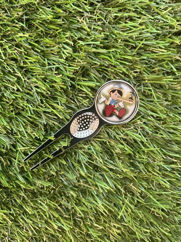 PINOCCHIO GOLF BALL MARKER AND PITCH REPAIR TOOL