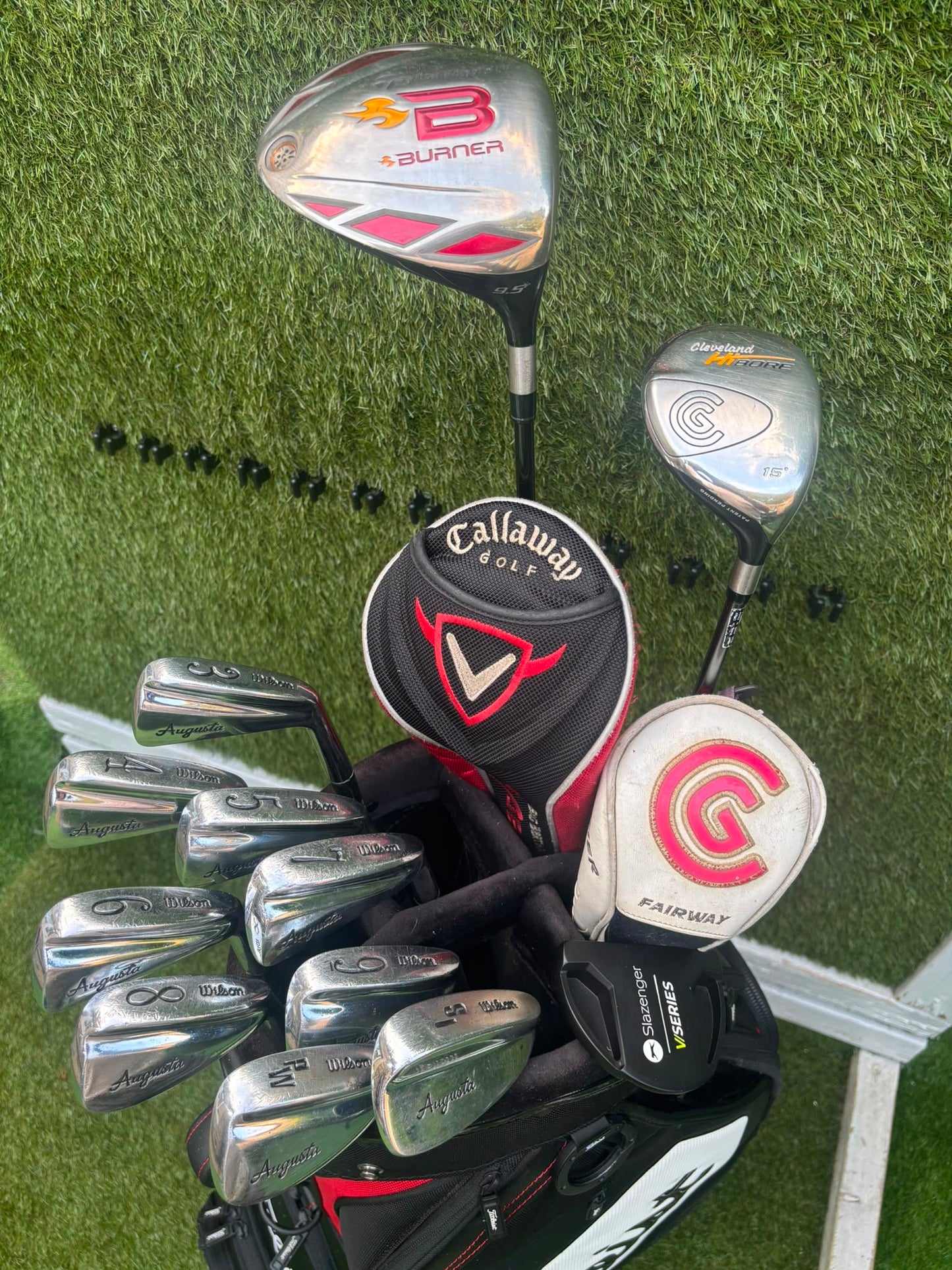 Wilson 3–SW Irons, TaylorMade Driver, Cleveland Fairway, Slazenger Putter & Titleist Cart Bag