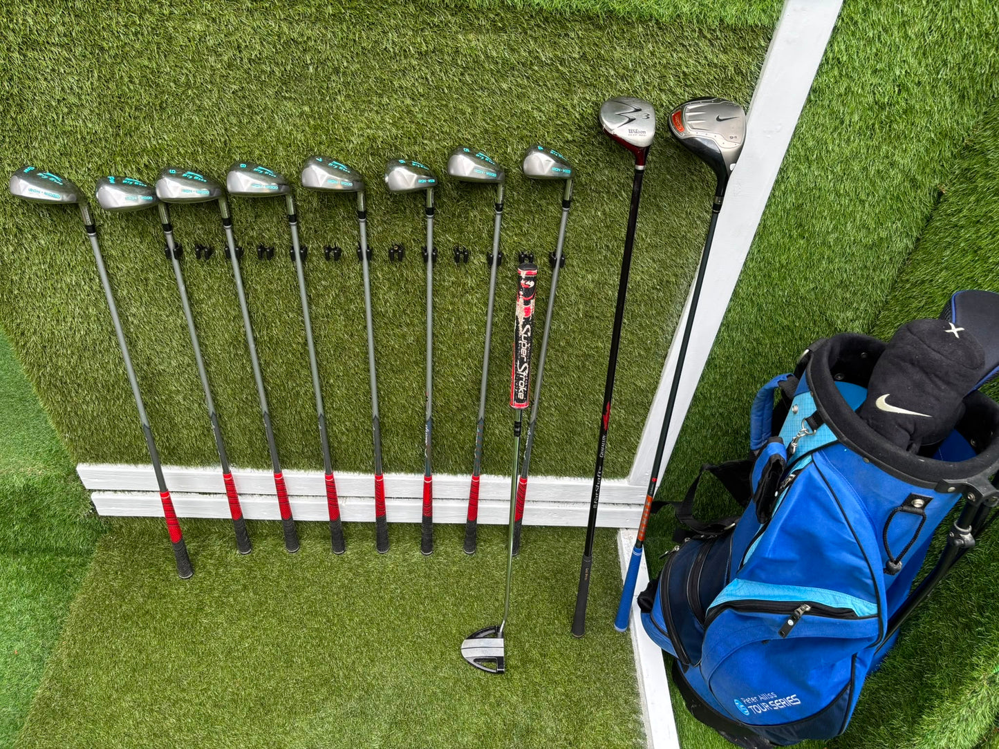 Slazenger Iron-Woods, Nike Driver, Wilson Fairway Wood, Voodoo Daddy Putter & Stand Bag