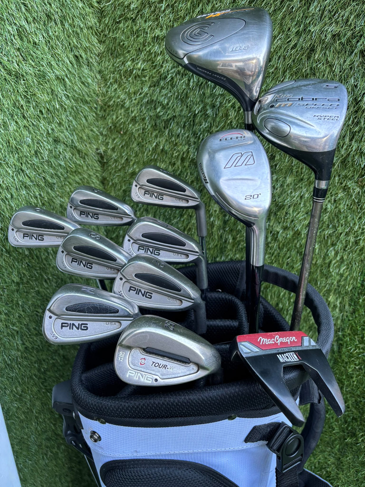 PING S59 4–PW Irons, Tour-W 52° Wedge, Cleveland HiBore Driver, Cobra 5 Wood, Mizuno Hybrid, MacGregor Putter & Stand Bag