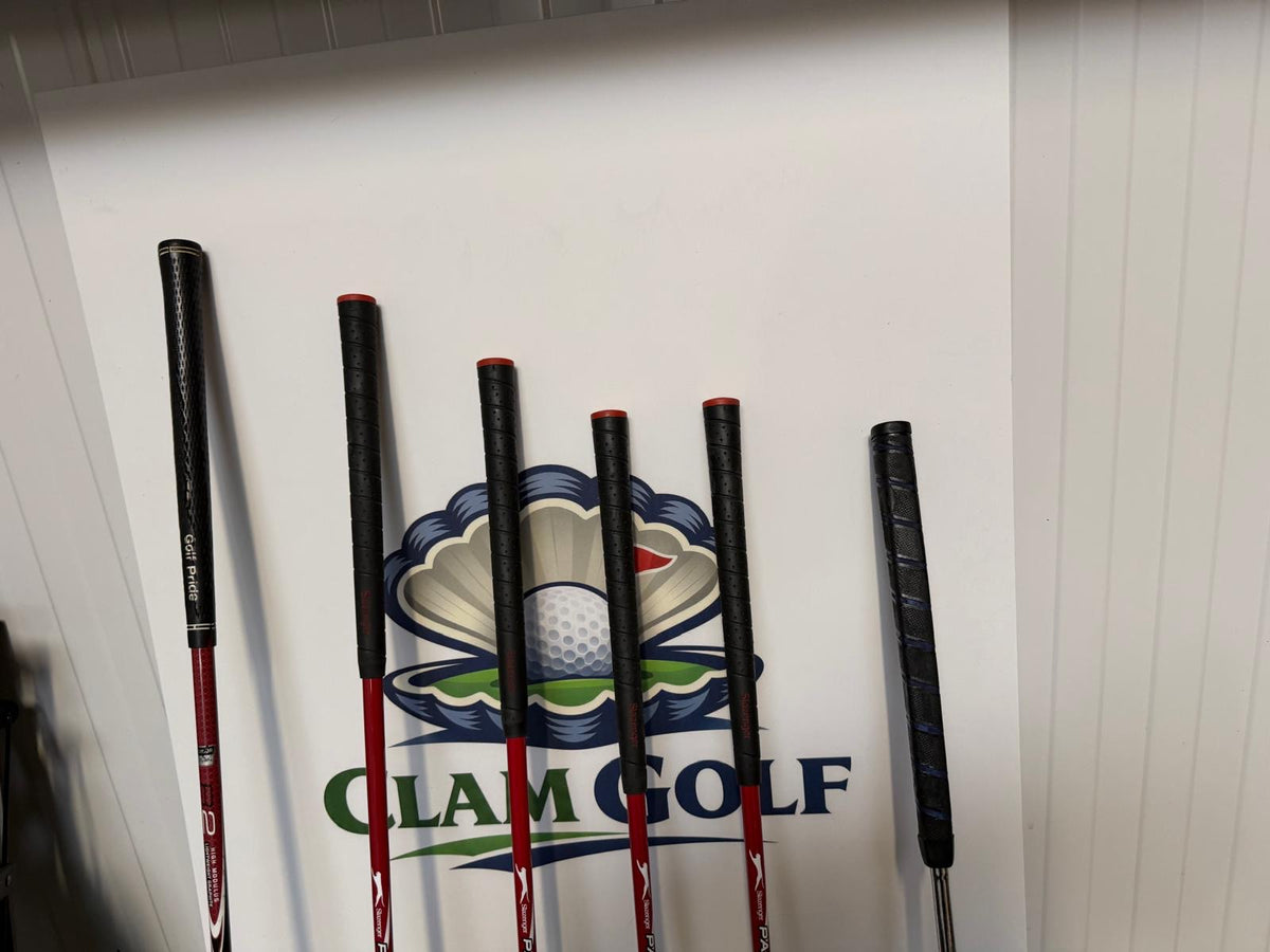 Junior Right Handed Golf Clubs and Bag Set. All in good used condition, 7 iron measures 27 inches so suitable for 5-7 year olds.