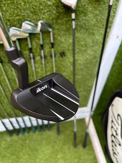 Wilson 3–SW Irons, TaylorMade Driver, Cleveland Fairway, Slazenger Putter & Titleist Cart Bag
