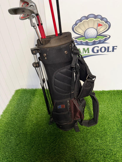 Junior Right Handed Golf Clubs and Bag Set. All in good used condition, 7 iron measures 27 inches so suitable for 5-7 year olds.