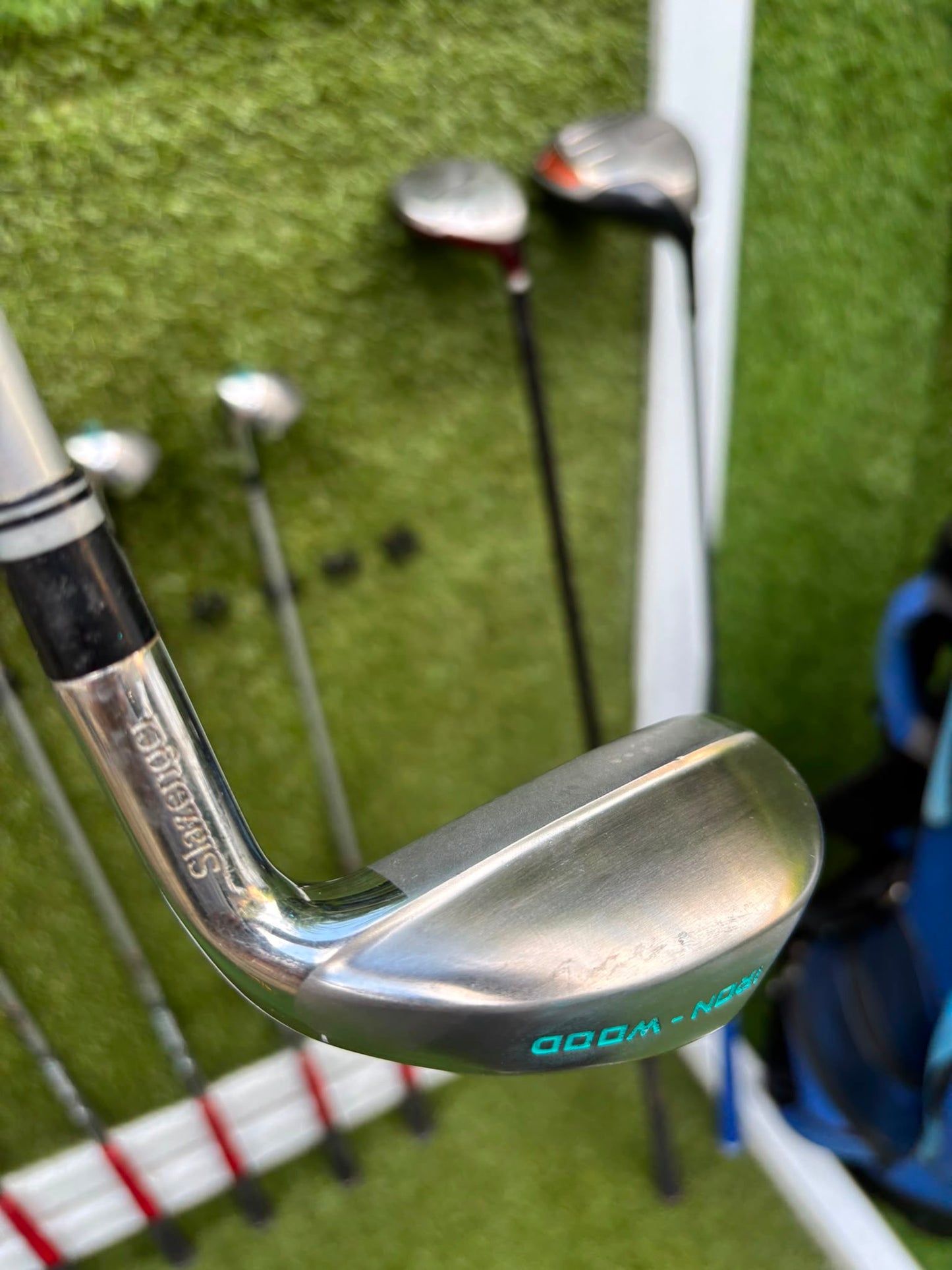 Slazenger Iron-Woods, Nike Driver, Wilson Fairway Wood, Voodoo Daddy Putter & Stand Bag