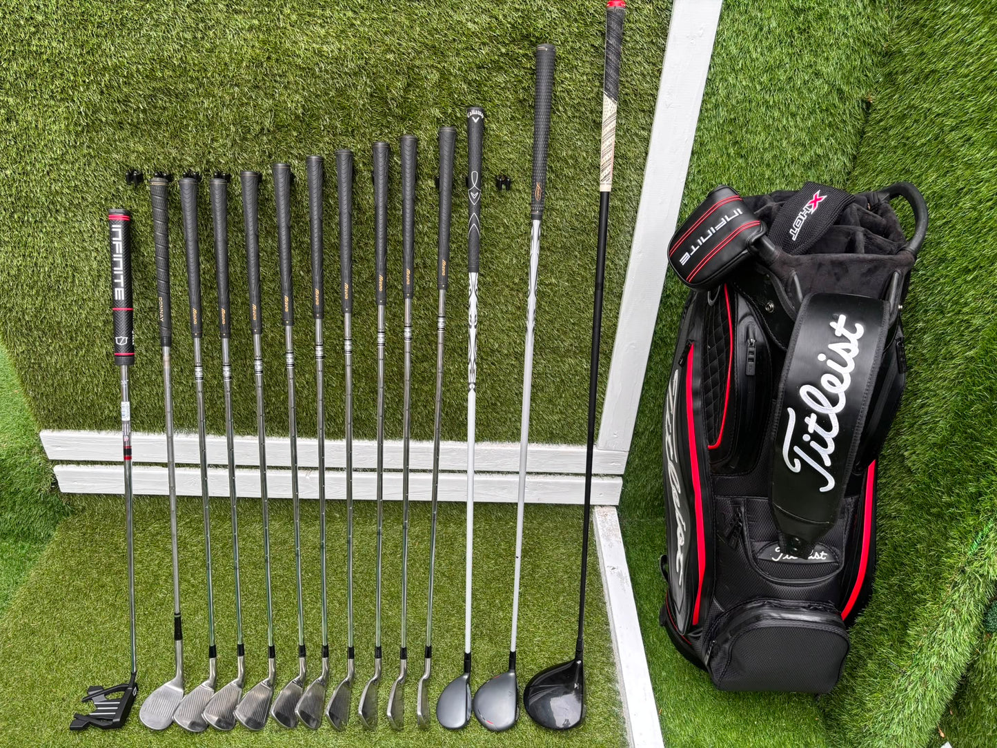 Mizuno Widec II Irons, Titleist 913 Driver, Callaway X Hot Woods, Wilson Infinite Putter & Titleist StaDry Cart Bag