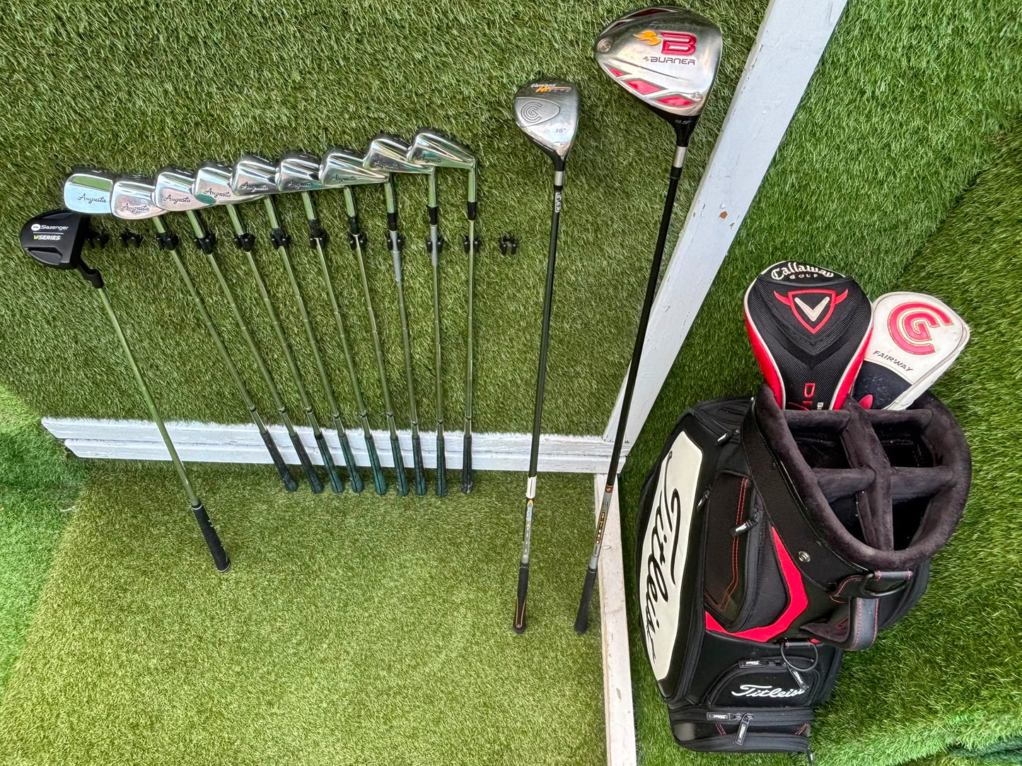 Wilson 3–SW Irons, TaylorMade Driver, Cleveland Fairway, Slazenger Putter & Titleist Cart Bag