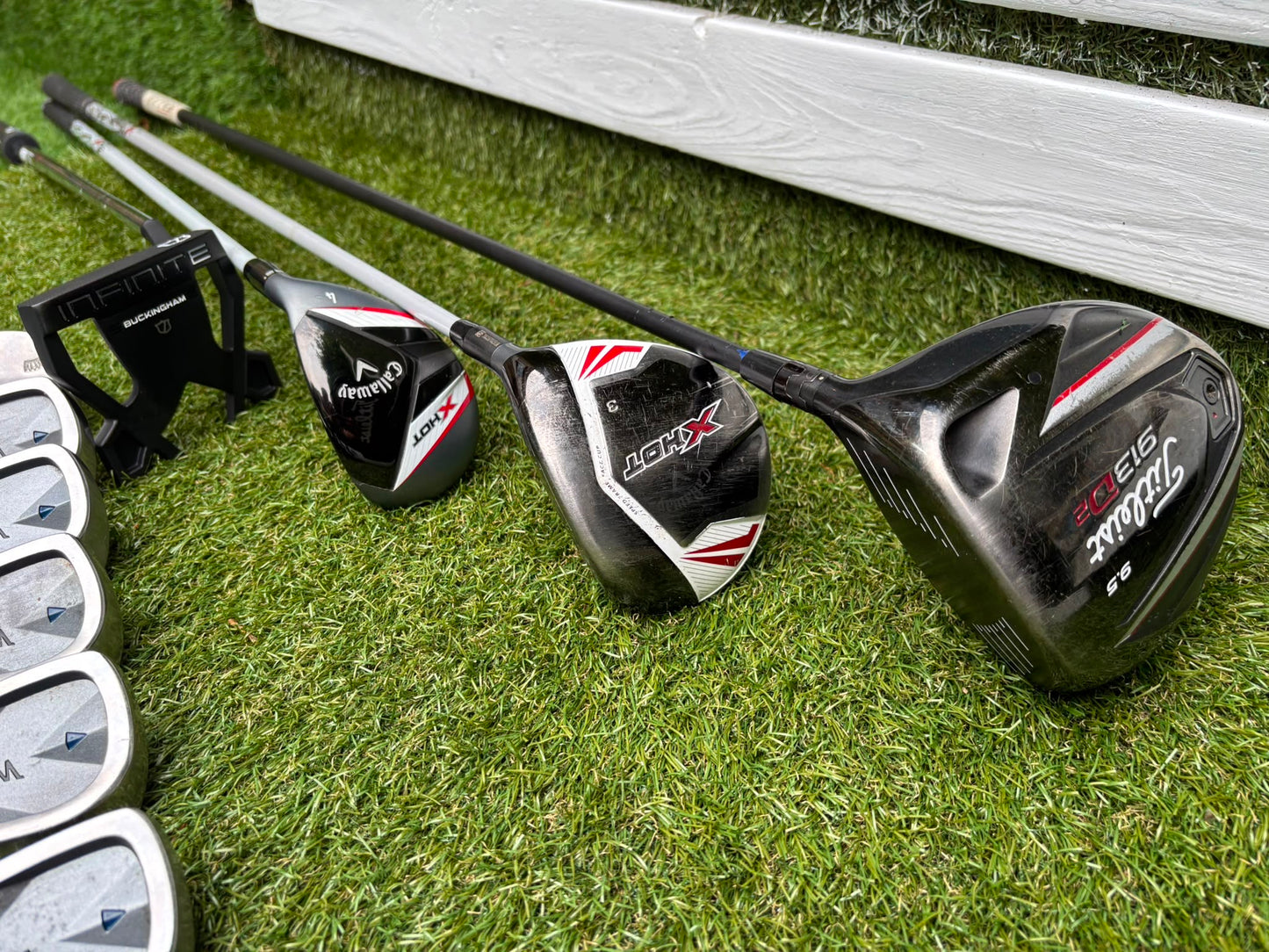 Mizuno Widec II Irons, Titleist 913 Driver, Callaway X Hot Woods, Wilson Infinite Putter & Titleist StaDry Cart Bag
