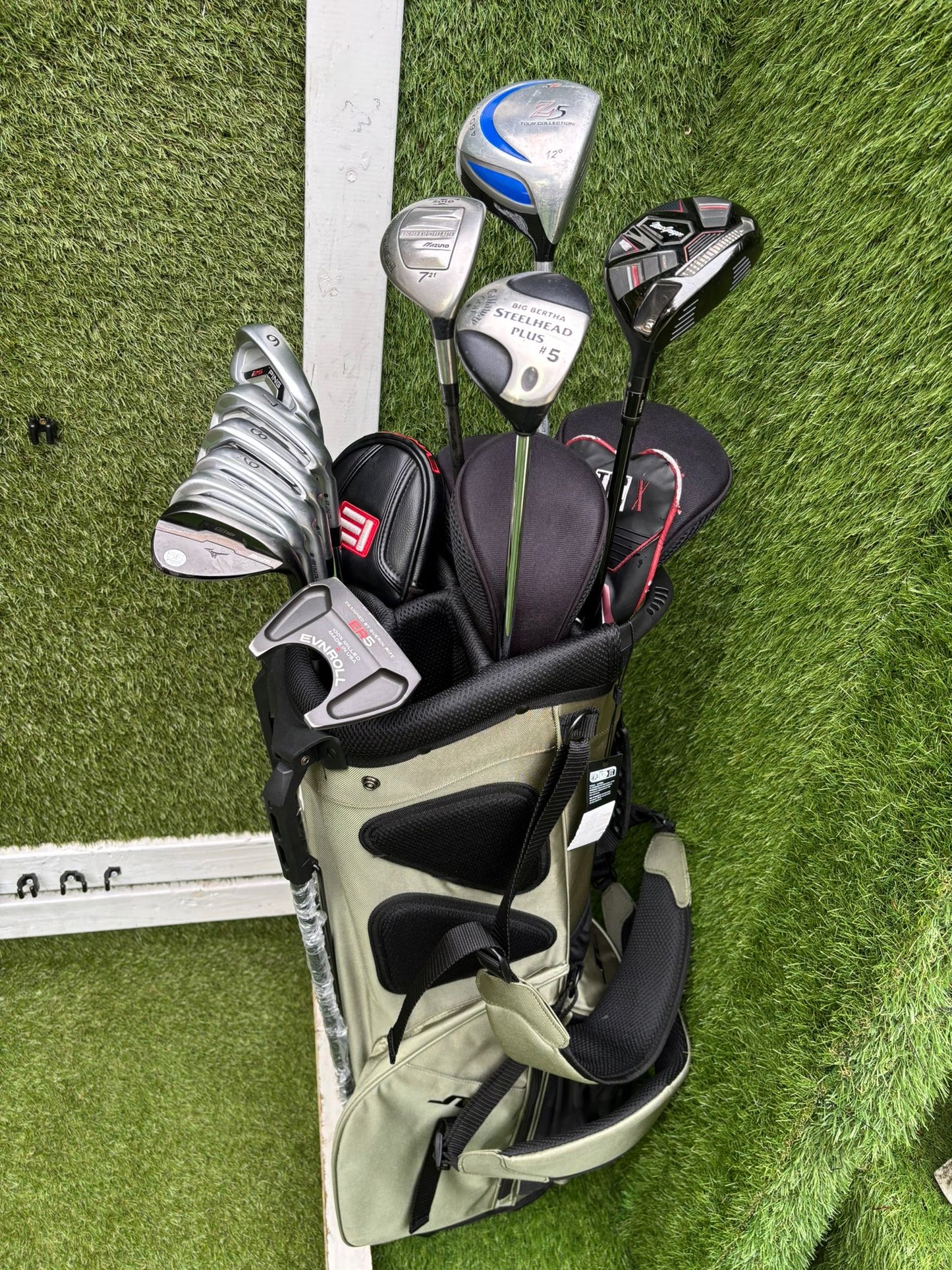 Ping i25 Irons, EVNROLL ER5 Putter, Mizuno S18 56°, Mizuno Zoid Hybrid, Mixed Woods & J.Lindeberg Stand Bag – 11 Clubs