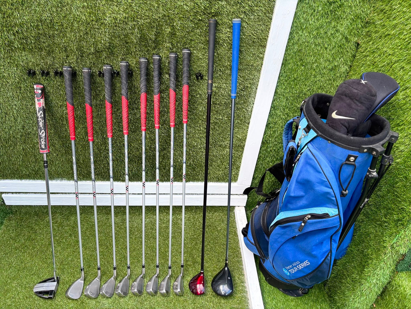 Slazenger Iron-Woods, Nike Driver, Wilson Fairway Wood, Voodoo Daddy Putter & Stand Bag