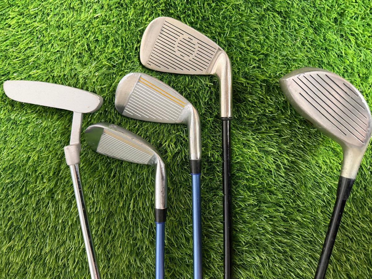 Junior Left Handed Golf Clubs and Bag Set. All in good used condition, 7 iron measures 32 inches so suitable for 9-12 year olds.