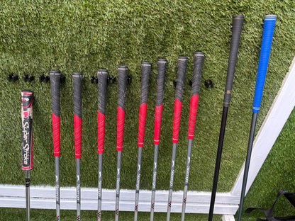 Slazenger Iron-Woods, Nike Driver, Wilson Fairway Wood, Voodoo Daddy Putter & Stand Bag