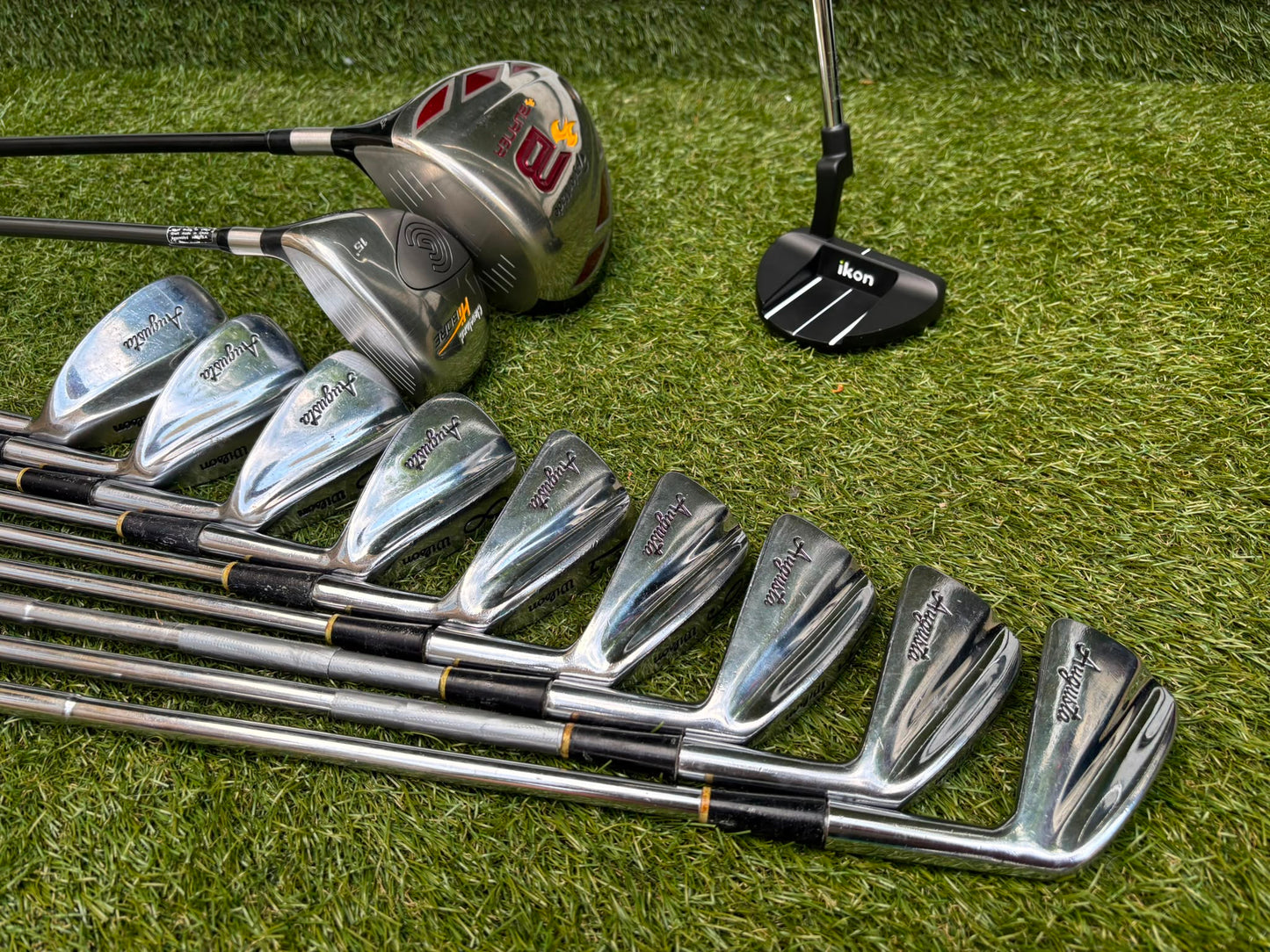 Wilson 3–SW Irons, TaylorMade Driver, Cleveland Fairway, Slazenger Putter & Titleist Cart Bag