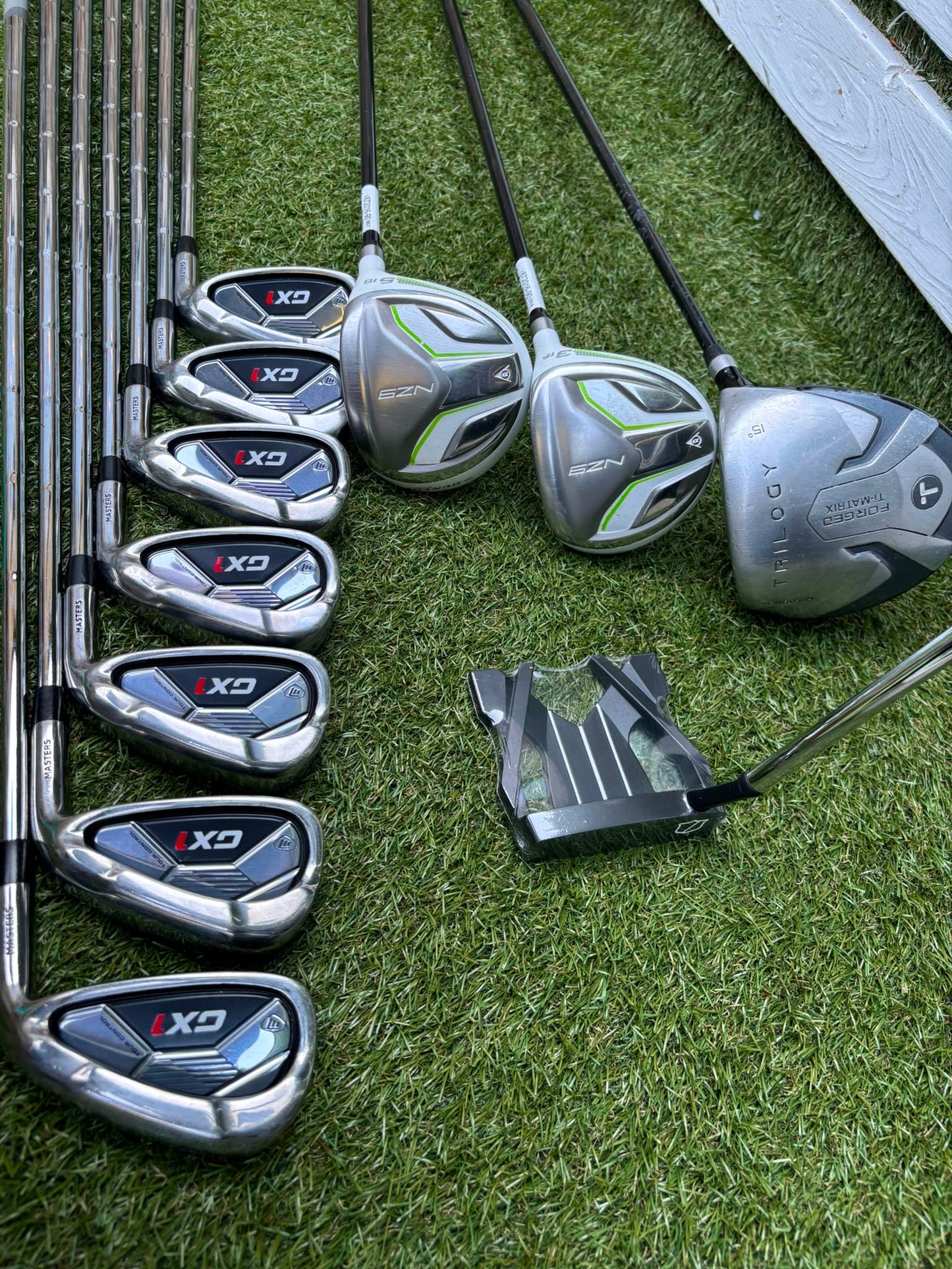 Masters GX1 Irons, Trilogy Ti-Matrix Driver, Dunlop NZ9 Fairway Woods, Wilson Infinite Buckingham Putter & PowaKaddy Cart Bag