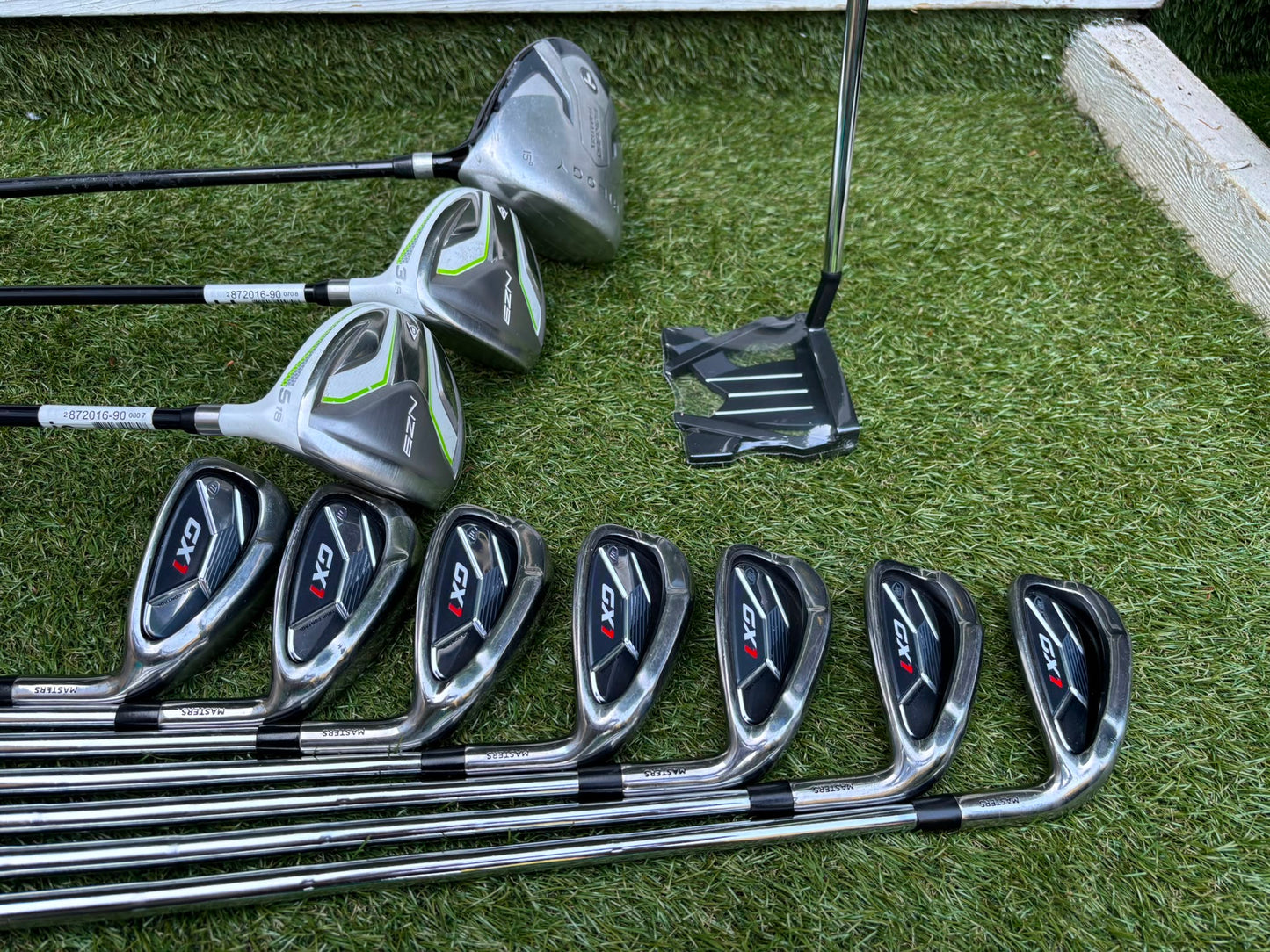 Masters GX1 Irons, Trilogy Ti-Matrix Driver, Dunlop NZ9 Fairway Woods, Wilson Infinite Buckingham Putter & PowaKaddy Cart Bag