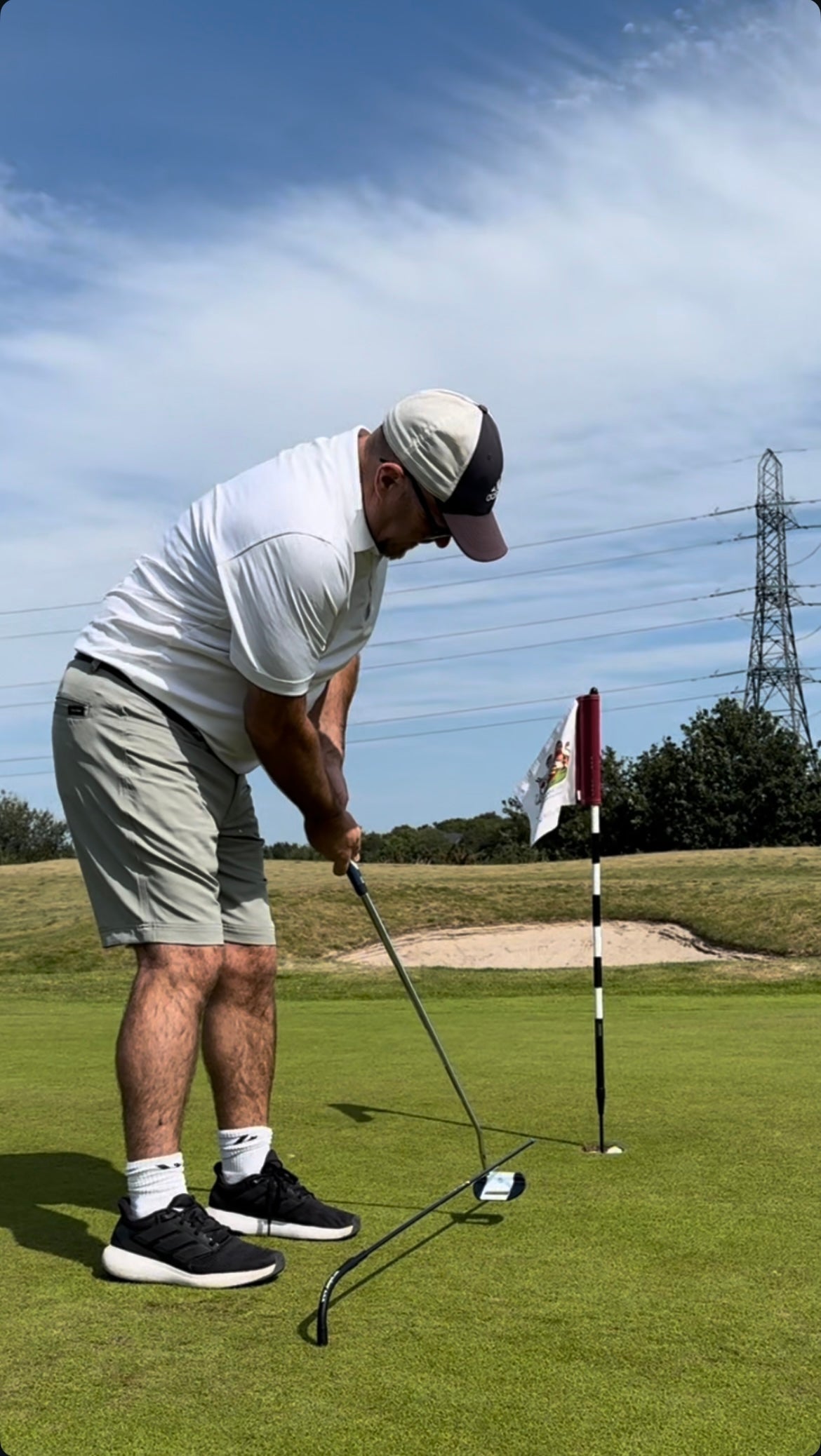 The Aimputt Trainer and The Golf Worm package.