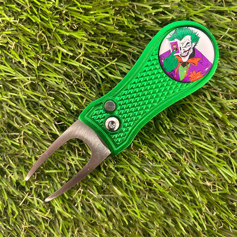 The JOKER  GOLF BALL MARKER AND Green  RETRACTABLE PITCH REPAIR TOOL