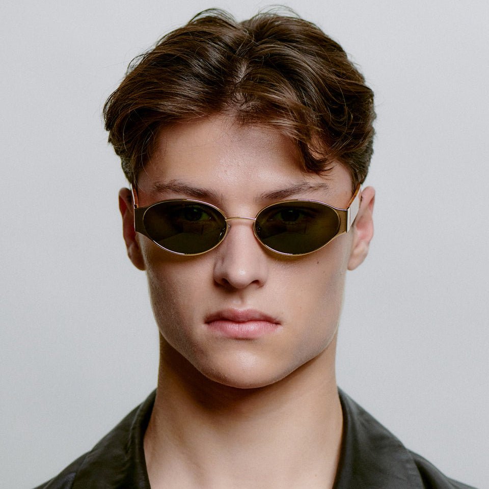 A.KJÆRBEDE BELLA Oval Sunglasses -  Gold Metal Frame / Burn Amber Temples